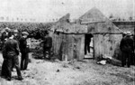 Police destroy the shack where George Streeter lived, 1902. Via Newspapers.com.