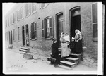 Industrial nurse visiting a factory worker's home, 1919. Via Library of Congress, Prints & Photographs Division, American National Red Cross Collection.