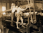 Children working in a Georgia textile mill, 1909. Via Library of Congress.