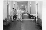 Central corridor with operating rooms on left and right, Rome 1944. Via Galter Special Collections.