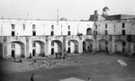 Courtyard of the Caserma Vittorio Emmanuele venereal center, Naples, 1944. Via Galter Special Collections.