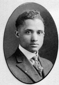 Black and white portrait photograph of Theodore K. Lawless, dressed in suite and tie, from medical school Class of 1919 graduation picture. 