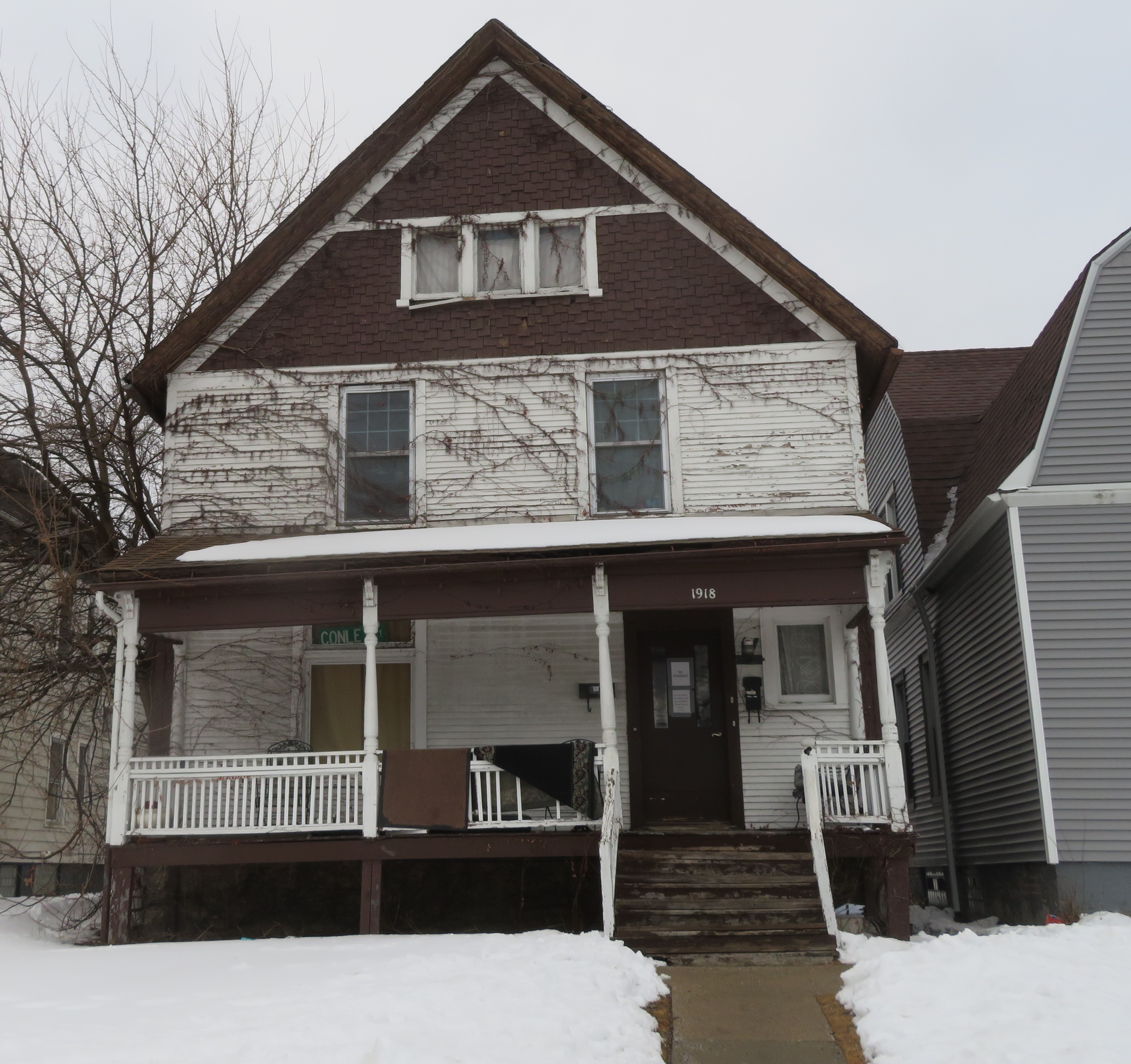 Photo of  two-story 1918 Asbury Avenue frame house taken in 2022.